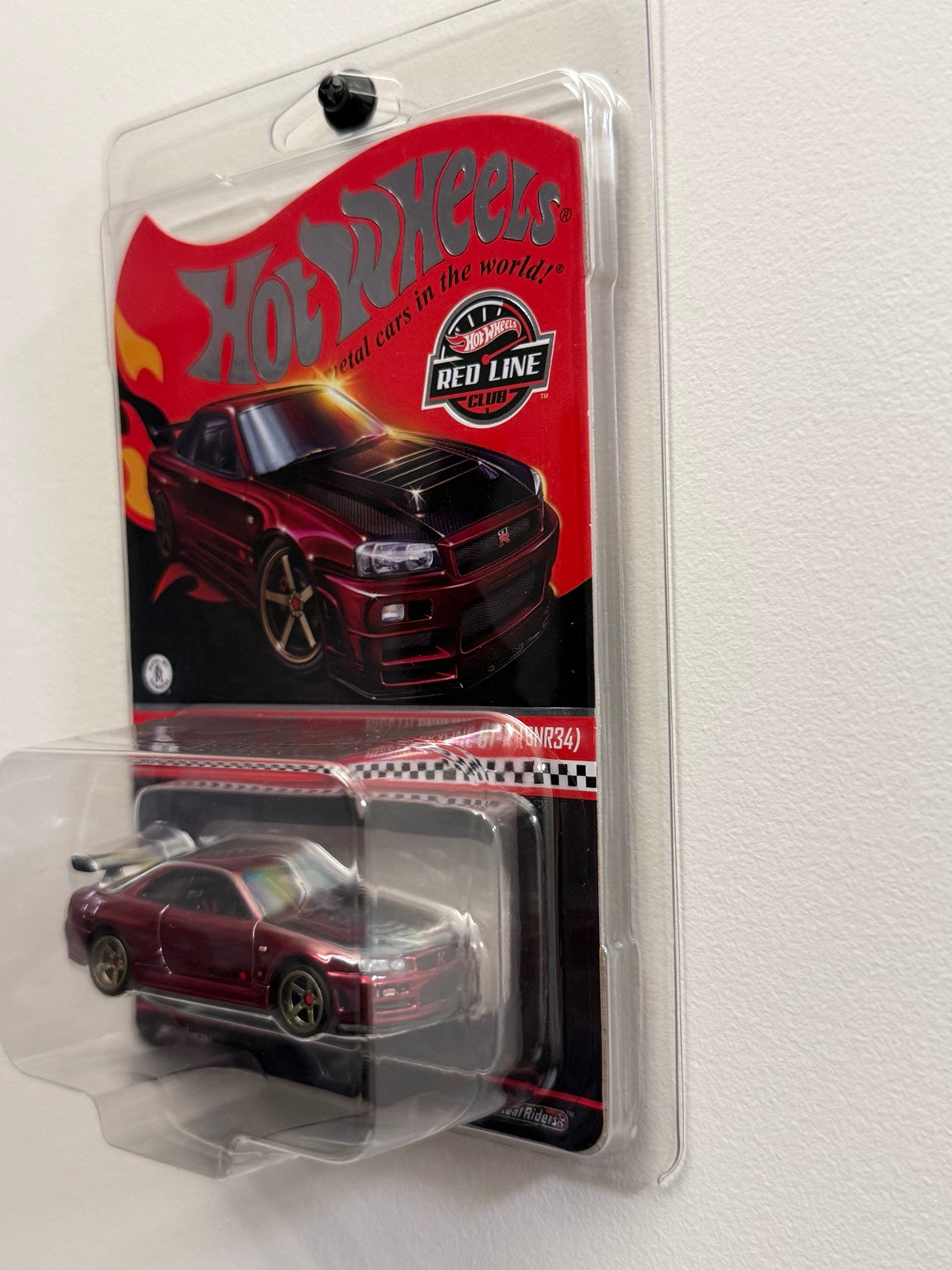 Nissan Skyline GT-R (BNR34) – 2024 RLC sELECTIONs – Hot Wheels angled packaging view