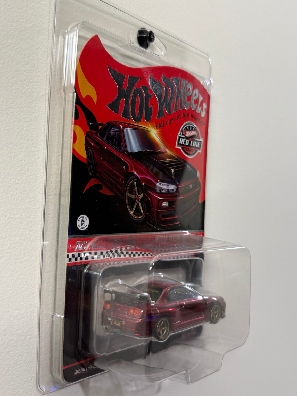 Nissan Skyline GT-R (BNR34) – 2024 RLC sELECTIONs – Hot Wheels angled packaging view
