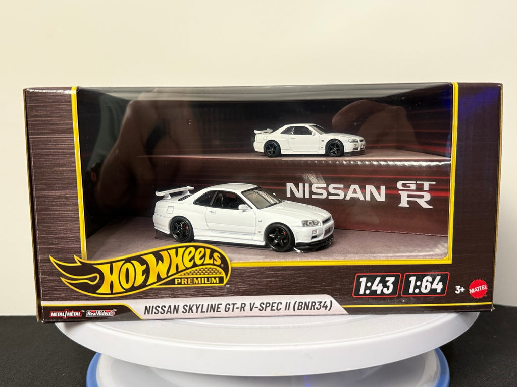 White Nissan Skyline GT-R V-Spec II BNR34 Hot Wheels Premium 1:43 and 1:64 boxed set, front view
