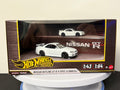 White Nissan Skyline GT-R V-Spec II BNR34 Hot Wheels Premium 1:43 and 1:64 boxed set, front view