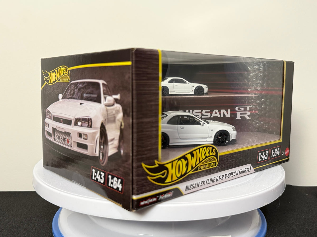 White Nissan Skyline GT-R V-Spec II BNR34 Hot Wheels Premium 1:43 and 1:64 boxed set, angled view